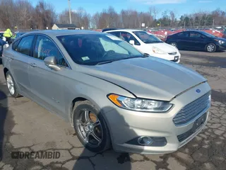 2015 Ford Fusion SE Hybrid with VIN 3FA6P0LUXFR133979, listed as a IAAI auction lot 41831288 with 143,738 mi miles. Bid and sale history available at carsss.com. Image 1.