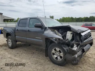 2014 Toyota Tacoma with VIN 3TMLU4EN3EM134468, listed as a Copart auction lot 60686435 with 154,926 mi miles and Salvage title. Bid and sale history available at DreamBid. Image 4.
