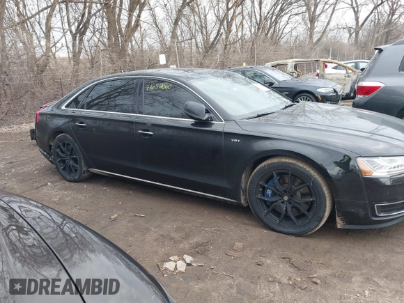 2015 Audi A8 L 4.0T with VIN WAU32AFD5FN026108, listed as a IAAI auction lot 41652860 with 148,253 mi miles. Bid and sale history available at carsss.com. Image 14.