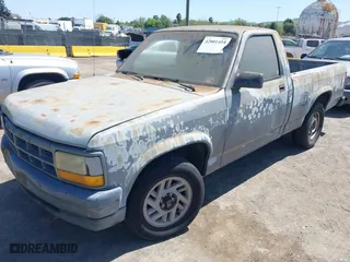 1992 Dodge Dakota "S" with VIN 1B7FL26X5NS691362, listed as a IAAI auction lot 42001454 with 161,181 mi miles. Bid and sale history available at carsss.com. Image 2.
