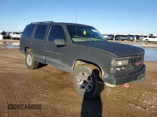 1997 GMC Yukon with VIN 1GKEK13R0VJ710179, listed as a Copart auction lot 81374234 with 186,257 mi miles and Salvage Title. Bid and sale history available at carsss.com. Image 4.