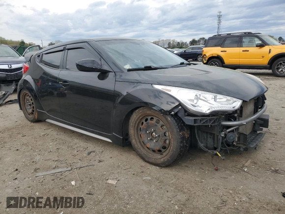 2013 Hyundai Veloster Turbo z VIN KMHTC6AE7DU152689, wystawiony jako Copart lot #51569125 z przebiegiem 102 152 mil mil oraz Szkoda całkowita • Salvage title. Historia ofert i sprzedaży dostępna na DreamBid. Obrazek 4.