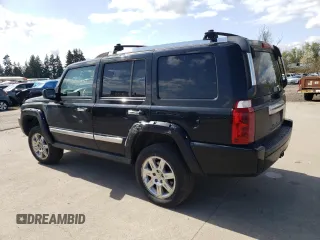 2008 Jeep Commander Overland with VIN 1J8HG68228C152923, listed as a Copart auction lot 51851365 with 182,674 mi miles and Salvage title. Bid and sale history available at DreamBid. Image 2.