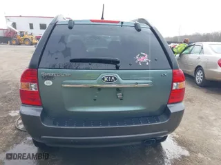 2007 Kia Sportage LX with VIN KNDJF724877403320, listed as a IAAI auction lot 41704797 with 330,684 mi miles. Bid and sale history available at carsss.com. Image 16.