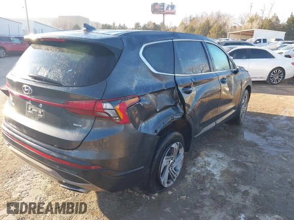 2021 Hyundai Santa Fe SE with VIN 5NMS1DAJXMH352741, listed as a IAAI auction lot 41273105 with 58,033 mi miles. Bid and sale history available at carsss.com. Image 4.