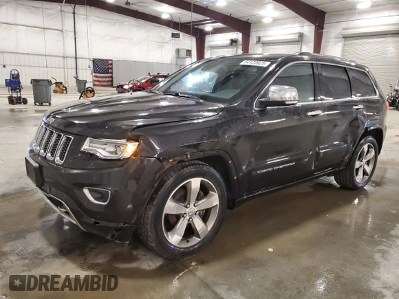 2015 Jeep Grand Cherokee Overland with VIN 1C4RJFCG7FC911899, listed as a Copart auction lot 54123925 with 243,031 mi miles and Salvage Title. Bid and sale history available at carsss.com. Image 1.