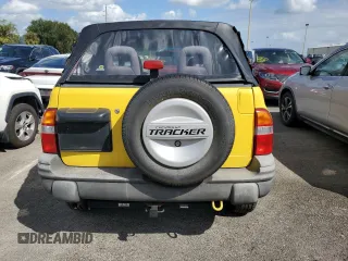 2002 Chevrolet Tracker z VIN 2CNBJ18C326943340, wystawiony jako Copart lot #74628774 z przebiegiem Nie podano mil oraz Szkoda całkowita • Salvage title. Historia ofert i sprzedaży dostępna na DreamBid. Obrazek 6.
