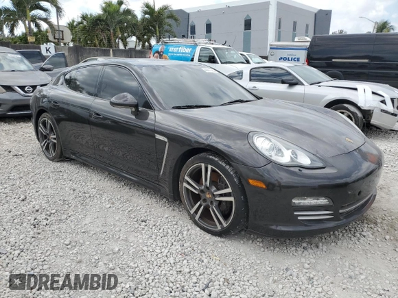 2013 Porsche Panamera с VIN WP0AA2A75DL016661, выставлен на аукционе Copart как лот 48977385 с пробегом 55 914 миль миль и Списание • Salvage title. История ставок и продаж доступна на DreamBid. Изображение 4.