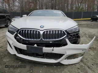 2019 BMW 8 Series M850i xDrive z VIN WBAFY4C57KBX29392, wystawiony jako Copart lot #51654905 z przebiegiem 83 651 mil mil oraz Szkody całkowita. Historia ofert i sprzedaży dostępna na DreamBid. Obrazek 5.