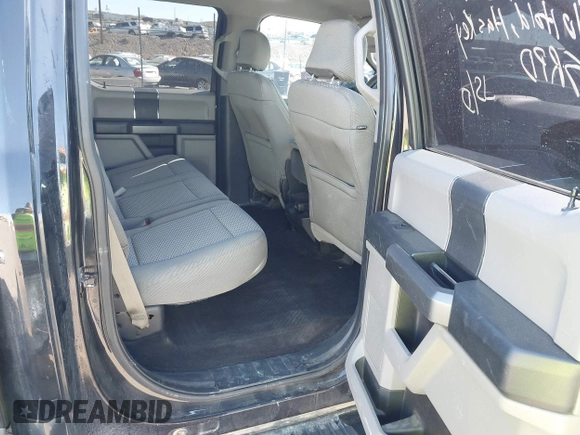 2015 Ford F-150 XLT with VIN 1FTEW1EP0FFC39327, listed as a IAAI auction lot 41012296 with 198,611 mi miles. Bid and sale history available at carsss.com. Image 8.