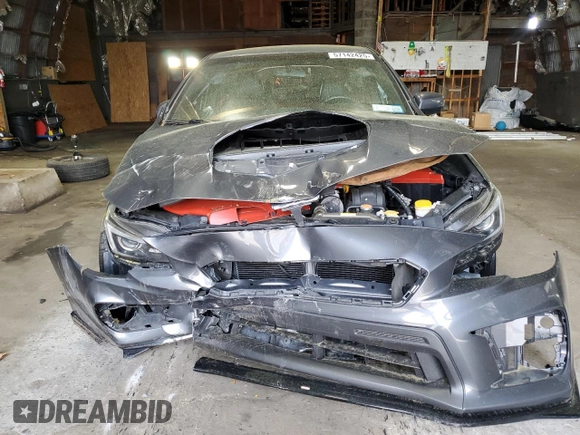 2020 Subaru WRX STI z VIN JF1VA2E65L9818521, wystawiony jako Copart lot #57142425 z przebiegiem 37 495 mil mil oraz Szkoda całkowita • Salvage title. Historia ofert i sprzedaży dostępna na DreamBid. Obrazek 5.