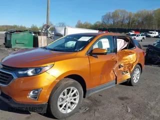 2018 Chevrolet Equinox LT with VIN 2GNAXSEV6J6124161, listed as a IAAI auction lot 42128338 with 69,105 mi miles and . Bid and sale history available at carsss.com. Image 6.