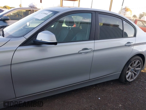 2013 BMW 3 Series 320i with VIN WBA3B1C53DK128079, listed as a IAAI auction lot 41316846 with 138,559 mi miles. Bid and sale history available at carsss.com. Image 14.