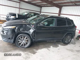 2014 Jeep Cherokee Limited with VIN 1C4PJMDS4EW182532, listed as a IAAI auction lot 42368726 with 124,060 mi miles and . Bid and sale history available at DreamBid. Image 14.
