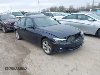 2014 BMW 3 Series 328i xDrive with VIN WBA3B5G57ENS06980, listed as a IAAI auction lot 42027714 with 110,773 mi miles. Bid and sale history available at carsss.com. Image 1.