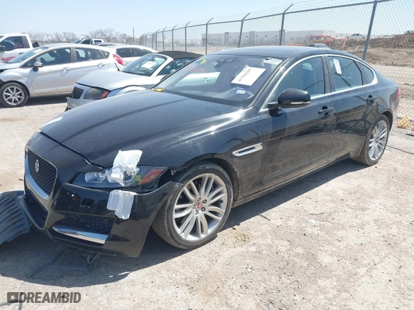 2016 Jaguar XF 35t Prestige with VIN SAJBE4BV8GCY02560, listed as a IAAI auction lot 41704209 with 109,917 mi miles. Bid and sale history available at carsss.com. Image 2.