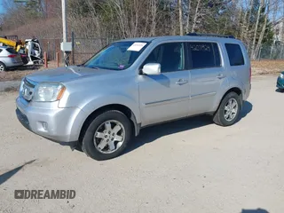2011 Honda Pilot Touring with VIN 5FNYF4H96BB012122, listed as a IAAI auction lot 42071924 with 211,000 mi miles. Bid and sale history available at carsss.com. Image 2.