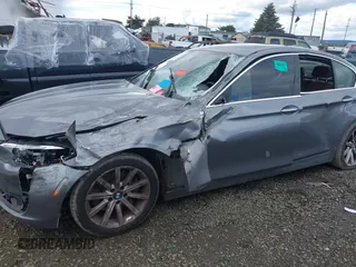 2014 BMW 5 Series 535i with VIN WBA5B1C51ED475098, listed as a IAAI auction lot 41517762 with 102,611 mi miles and . Bid and sale history available at carsss.com. Image 6.