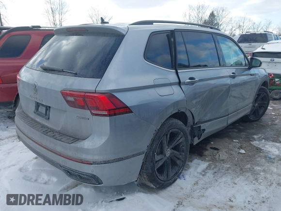2023 Volkswagen Tiguan SE R-Line Black with VIN 3VV8B7AX3PM106873, listed as a IAAI auction lot 41402146 with 26,701 mi miles and . Bid and sale history available at DreamBid. Image 4.