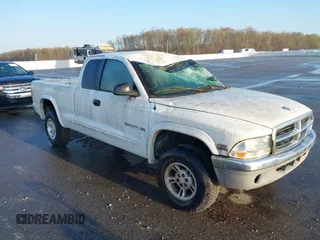 1998 Dodge Dakota SLT z VIN 1B7GG22X2WS519726, wystawiony jako IAAI lot #42003437 z przebiegiem 213 998 mil mil oraz . Historia ofert i sprzedaży dostępna na DreamBid. Obrazek 1.