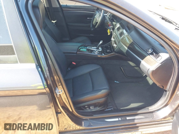 2013 BMW 5 Series 528i with VIN WBAXG5C5XDD233300, listed as a IAAI auction lot 41996457 with 91,899 mi miles and . Bid and sale history available at carsss.com. Image 5.