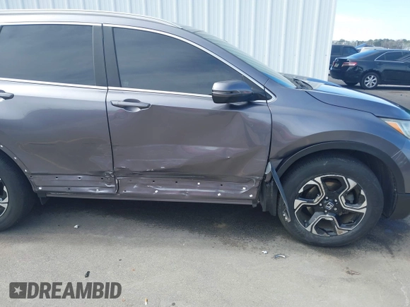 2018 Honda CR-V Touring with VIN 7FARW1H9XJE018575, listed as a IAAI auction lot 41747192 with 83,699 mi miles and . Bid and sale history available at carsss.com. Image 6.