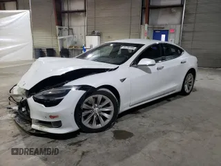 2016 Tesla Model S 70 kWh Battery with VIN 5YJSA1E15GF170475, listed as a Copart auction lot 85794104 with 68,882 mi miles and Salvage Title. Bid and sale history available at carsss.com. Image 1.