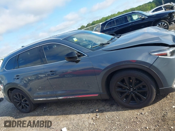 2021 Mazda CX-9 Grand Touring with VIN JM3TCADY7M0528223, listed as a IAAI auction lot 42395861 with 57,767 mi miles and . Bid and sale history available at DreamBid. Image 13.