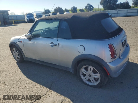 2005 MINI Convertible with VIN WMWRF33465TG10044, listed as a Copart auction lot 50364235 with 152,186 mi miles and Salvage title. Bid and sale history available at DreamBid. Image 2.