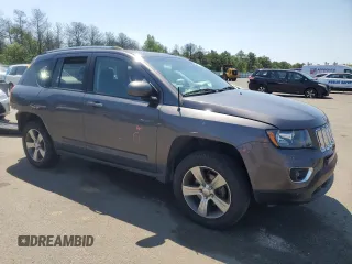 2016 Jeep Compass High Altitude with VIN 1C4NJDEB0GD709177, listed as a Copart auction lot 61248065 with 45,558 mi miles and Salvage title. Bid and sale history available at DreamBid. Image 4.