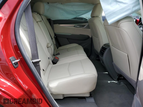 2023 Cadillac XT5 FWD Premium Luxury z VIN 1GYKNCRS5PZ173528, wystawiony jako Copart lot #55805605 z przebiegiem 7 789 mil mil oraz Szkoda całkowita • Salvage title. Historia ofert i sprzedaży dostępna na DreamBid. Obrazek 11.