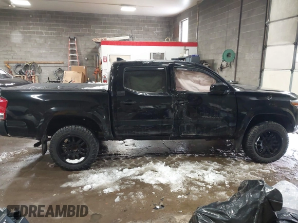 2016 Toyota Tacoma SR with VIN 3TMCZ5AN5GM037336, listed as a IAAI auction lot 41599492 with 76,262 mi miles. Bid and sale history available at carsss.com. Image 13.