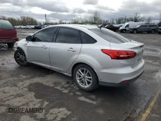 2016 Ford Focus SE with VIN 1FADP3F27GL230723, listed as a Copart auction lot 45467755 with 140,095 mi miles and Salvage title. Bid and sale history available at DreamBid. Image 2.