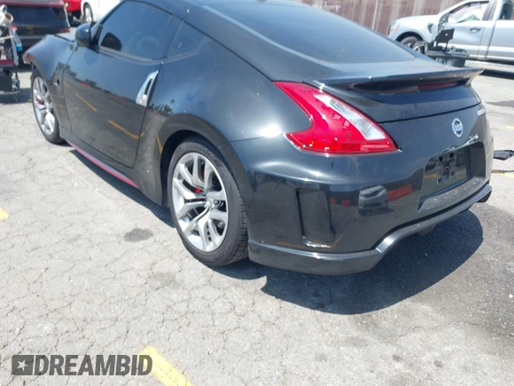 2015 Nissan 370Z Sport with VIN JN1AZ4EH3FM441836, listed as a IAAI auction lot 42094959 with 59,004 mi miles and . Bid and sale history available at DreamBid. Image 3.