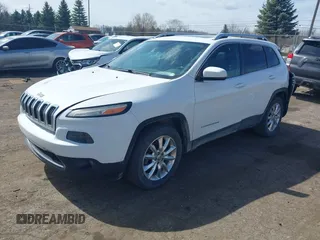 2015 Jeep Cherokee Limited with VIN 1C4PJMDS7FW522581, listed as a IAAI auction lot 41870516 with 143,904 mi miles and . Bid and sale history available at DreamBid. Image 2.