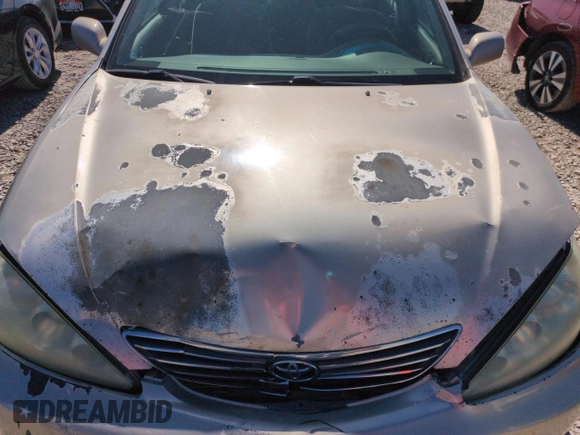 2005 Toyota Camry STD z VIN 4T1BE32K45U096575, wystawiony jako Copart lot #59634625 z przebiegiem 195 358 mil mil oraz Szkoda całkowita • Salvage title. Historia ofert i sprzedaży dostępna na DreamBid. Obrazek 11.