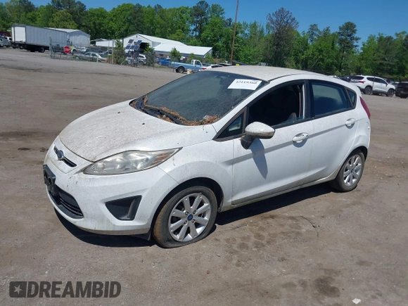 2013 Ford Fiesta SE with VIN 3FADP4EJ0DM109816, listed as a IAAI auction lot 42119360 with 164,397 mi miles and . Bid and sale history available at DreamBid. Image 2.
