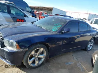 2014 Dodge Charger SXT with VIN 2C3CDXHGXEH148806, listed as a IAAI auction lot 41710035 with 210,296 mi miles and . Bid and sale history available at carsss.com. Image 13.