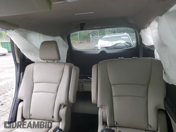 2021 Honda Pilot Touring 7-Passenger z VIN 5FNYF6H64MB004962, wystawiony jako Copart lot #57860225 z przebiegiem 52 311 mil mil oraz Szkoda całkowita • Salvage title. Historia ofert i sprzedaży dostępna na DreamBid. Obrazek 10.