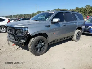 2023 GMC Yukon AT4 with VIN 1GKS2CKD6PR137989, listed as a Copart auction lot 76806404 with 30,732 mi miles and Salvage Title. Bid and sale history available at carsss.com. Image 1.