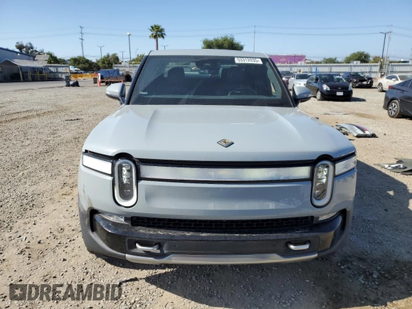 2022 Rivian R1T Adventure z VIN 7FCTGAAA0NN010103, wystawiony jako Copart lot #53312035 z przebiegiem 48 333 mil mil oraz Szkody całkowita. Historia ofert i sprzedaży dostępna na DreamBid. Obrazek 5.