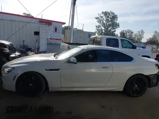 2012 BMW 6 Series 650i with VIN WBALX3C52CC528401, listed as a IAAI auction lot 42046910 with 105,844 mi miles. Bid and sale history available at carsss.com. Image 15.