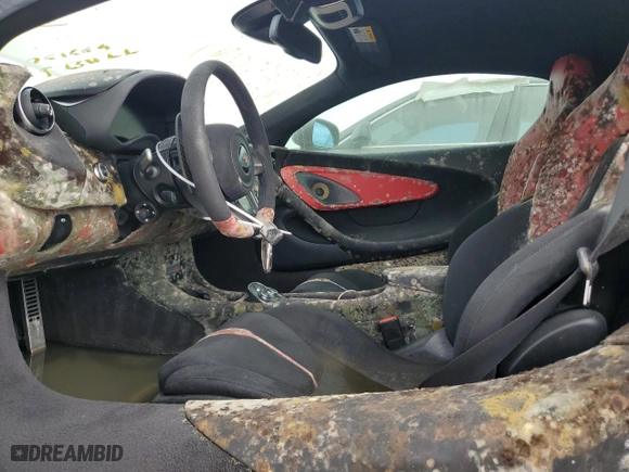 2017 McLaren 570S with VIN SBM13DAAXHW003255, listed as a Copart auction lot 76261244 with 0 mi miles and Salvage Title. Bid and sale history available at carsss.com. Image 7.