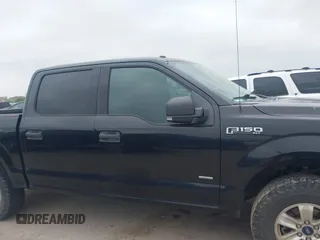 2015 Ford F-150 XLT with VIN 1FTEW1EG4FKD11928, listed as a IAAI auction lot 41912864 with 270,804 mi miles. Bid and sale history available at carsss.com. Image 13.