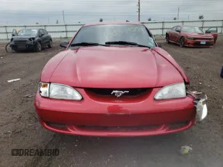1997 Ford Mustang with VIN 1FALP4040VF166533, listed as a Copart auction lot 66524354 with 71,082 mi miles and Salvage Title. Bid and sale history available at carsss.com. Image 5.