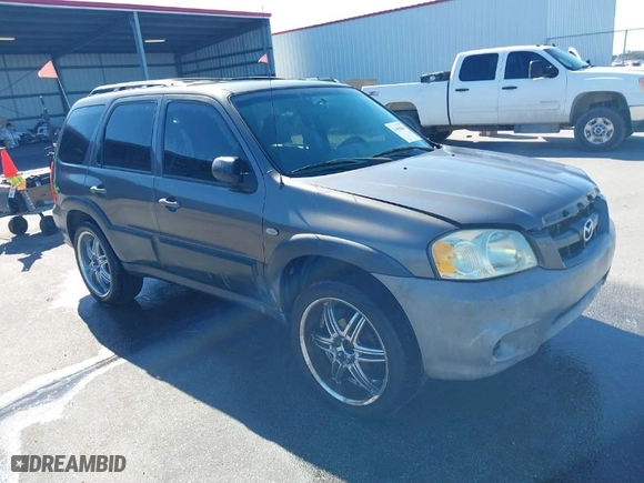 2006 Mazda Tribute i with VIN 4F2YZ02Z66KM05605, listed as a IAAI auction lot 41508057 with 266,708 mi miles. Bid and sale history available at carsss.com. Image 1.