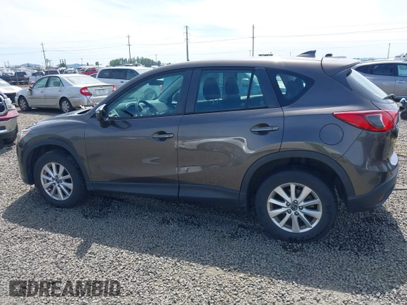 2016 Mazda CX-5 Sport with VIN JM3KE4BY8G0785812, listed as a IAAI auction lot 42324083 with 57,405 mi miles and . Bid and sale history available at DreamBid. Image 14.