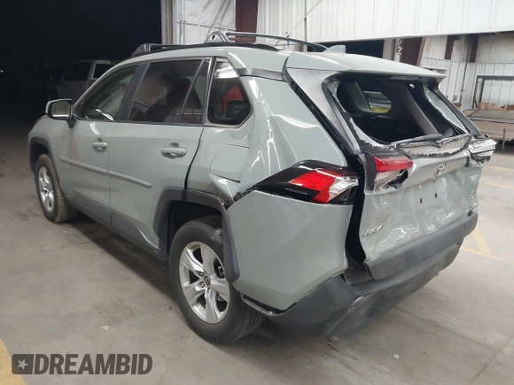 2019 Toyota RAV4 XLE with VIN JTMP1RFV2KD028137, listed as a IAAI auction lot 41931454 with 88,998 mi miles and . Bid and sale history available at DreamBid. Image 3.