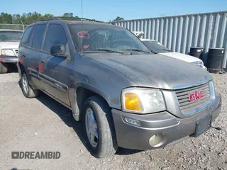 2005 GMC Envoy SLT with VIN 1GKDS13SX52175970, listed as a IAAI auction lot 42047871 with 205,432 mi miles. Bid and sale history available at carsss.com. Image 1.