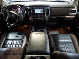2017 Nissan Titan Pro-4X with VIN 1N6BA1F46HN574314, listed as a Copart auction lot 55573985 with 98,812 mi miles and Salvage title. Bid and sale history available at DreamBid. Image 8.